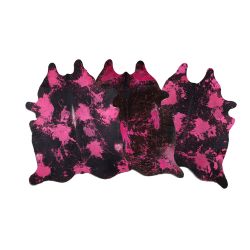 LG/XL Brazilian Pink splatter distressed Black cowhide rugs. Measures approx. 42.5-50 square feet